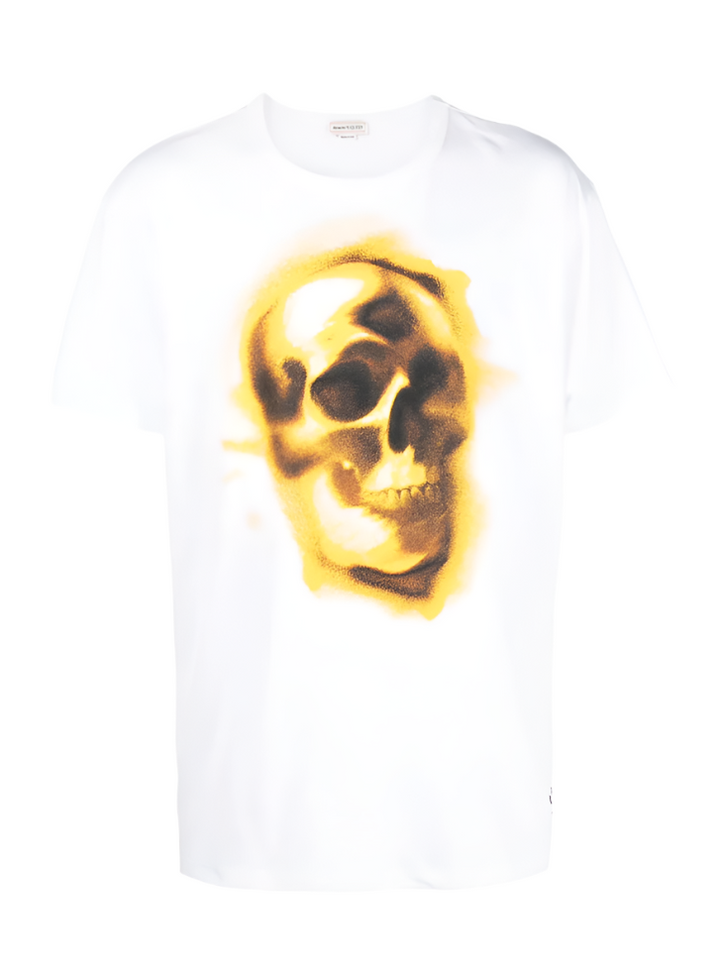 White t-shirt with a yellow skull design on a computer screen