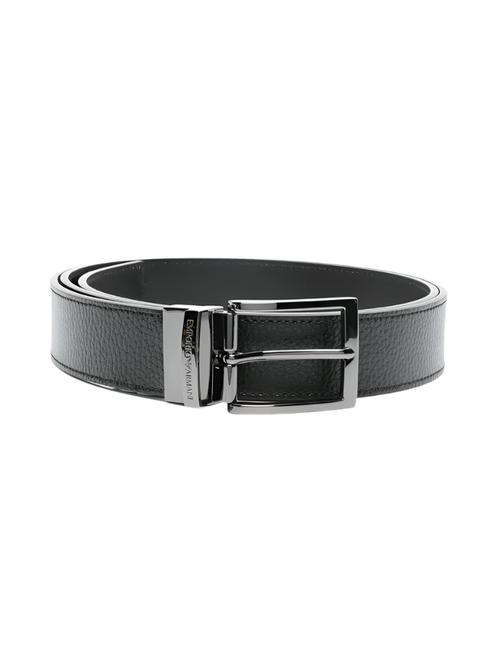 Black leather belt with silver buckle on a white background