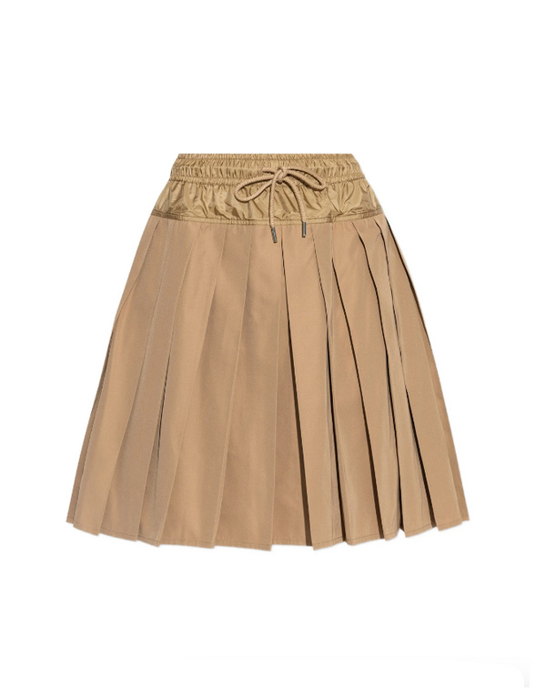 Beige pleated skirt on a white background