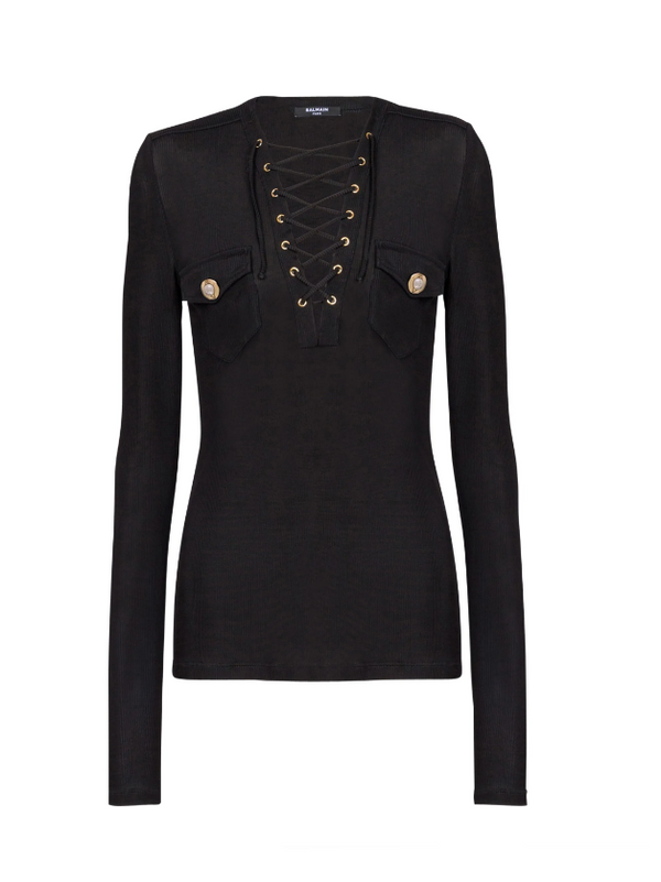 Black long-sleeve top with lace-up front and button details on a white background