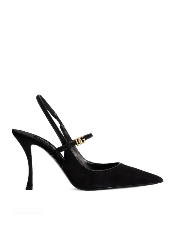 Black high-heeled shoe with a gold buckle on a white background