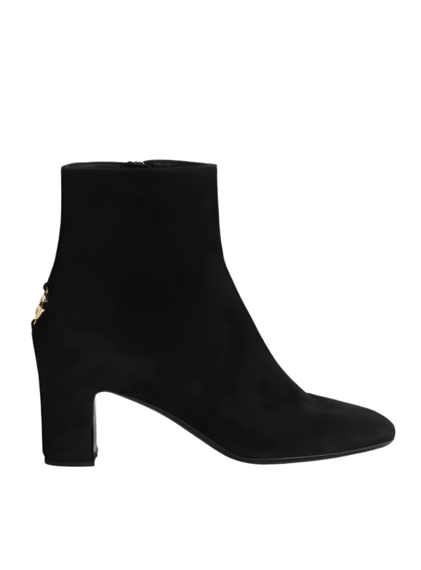 Black ankle boot on a white background