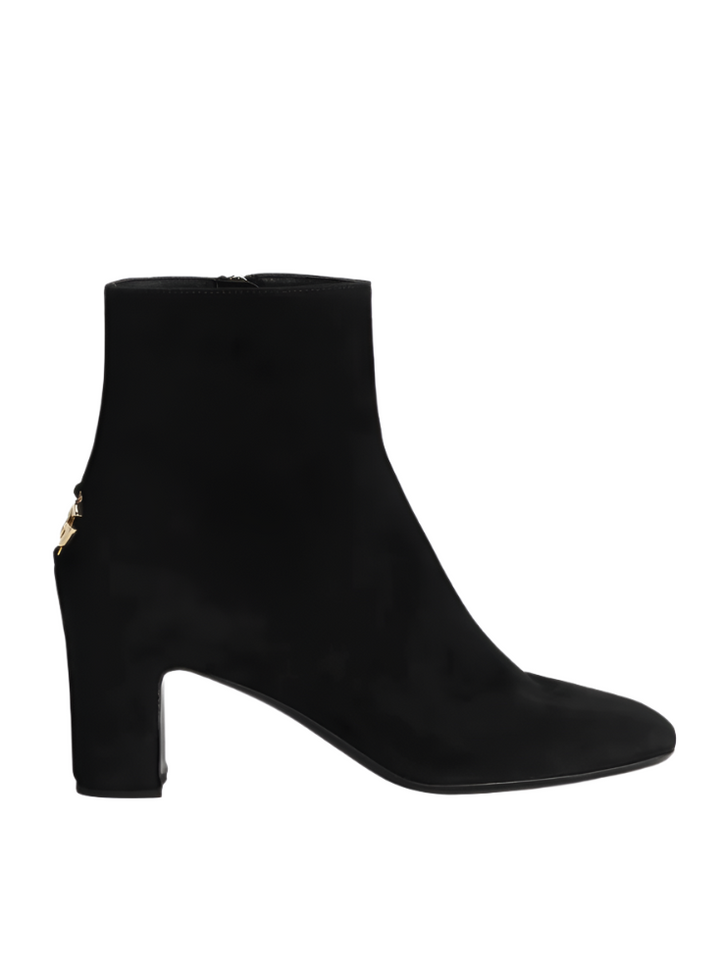 Black ankle boot on a white background