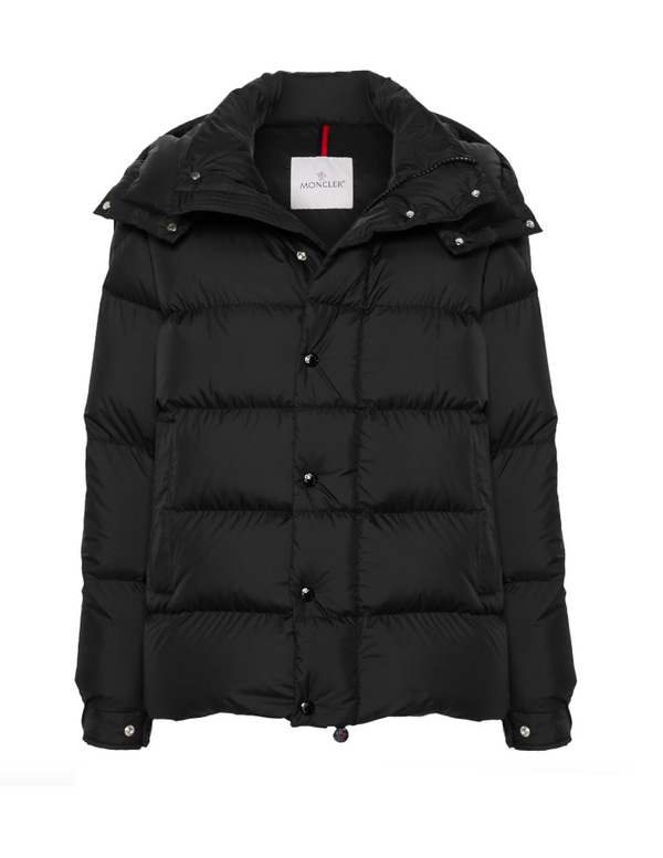 Black puffer jacket with a brand label on a white background