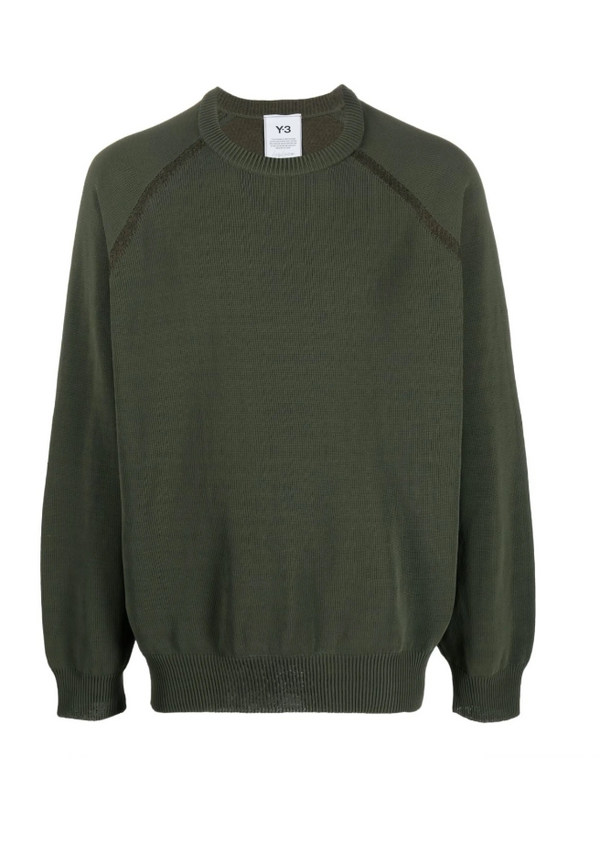 Green sweater on a white background