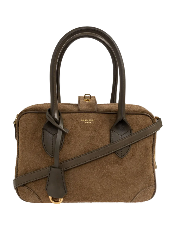 Brown handbag with black accents on a white background