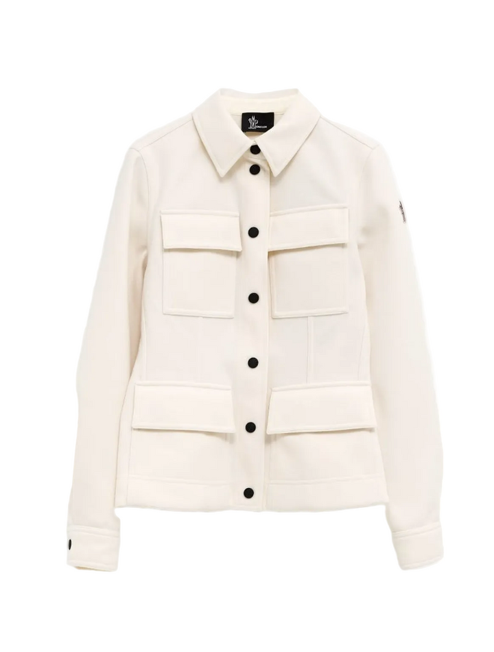 White jacket with black buttons on a white background